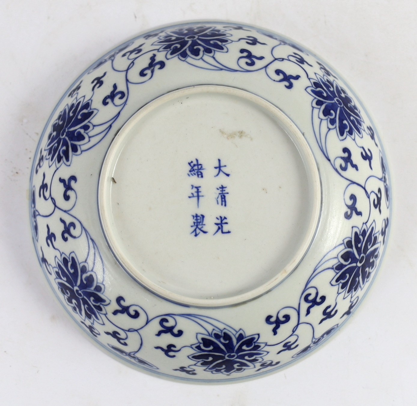 A Chinese blue and white ‘lotus’ dish, Guangxu mark and of the period (1875-1908), 15.5cm diameter